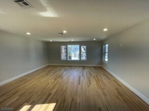 119-121 Lewis St in Paterson, NJ - Foto de edificio - Building Photo