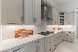 6051 Plana Cays Dr in Naples, FL - Building Photo - Building Photo