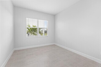 5709 Bristlecone Cmns in Westlake, FL - Building Photo - Building Photo