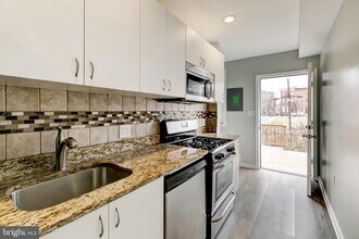 411 McAllister St in Baltimore, MD - Building Photo - Building Photo