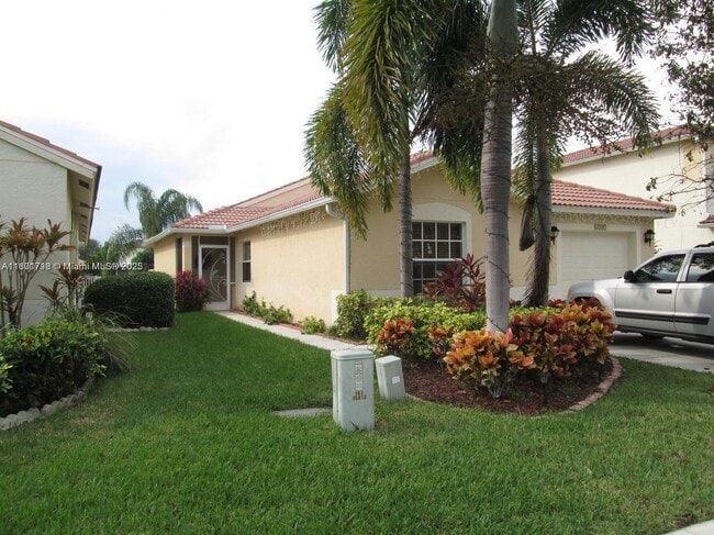 6597 Country Winds Cove in Greenacres, FL - Building Photo - Building Photo