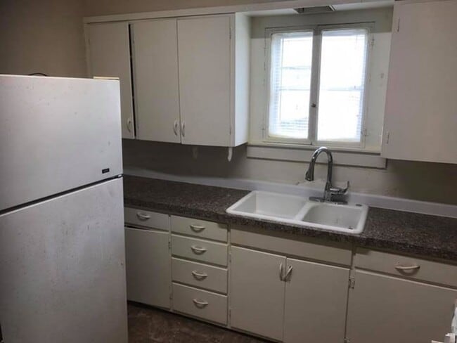 property at 115 E 15th St