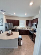 1825 Cayman Cove Cir in St. Cloud, FL - Building Photo - Building Photo
