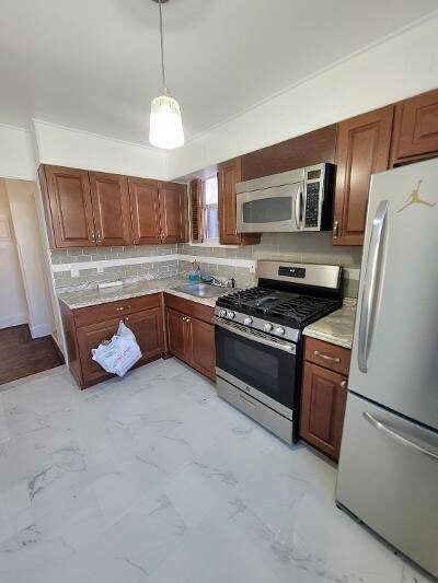 51-56-56 47th St, Unit 6315 in Queens, NY - Building Photo