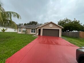 212 SW Yager Pl in Port St. Lucie, FL - Building Photo - Building Photo