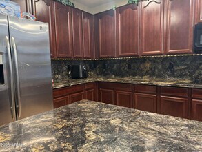 8815 W Carole Ln in Glendale, AZ - Building Photo - Building Photo