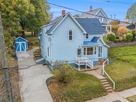 295 5th St, Unit Upper in Manistee, MI - Building Photo