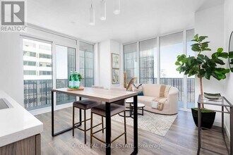 8 Eglinton Ave E in Toronto, ON - Building Photo - Building Photo