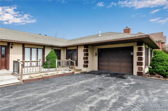 property at 9400 Wehrle Dr