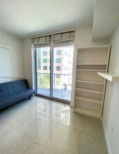 185 SW 7th St, Unit 1406 in Miami, FL - Building Photo - Building Photo