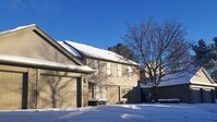 Attached Garages, Private Entrances - Birchwood Pointe Apartments in Midland, Michigan