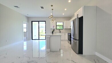 702 Hightower Ave S in Lehigh Acres, FL - Building Photo - Building Photo