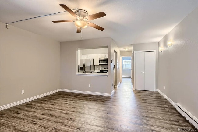 5873 S Prince St, Unit 103 in Littleton, CO - Building Photo - Building Photo