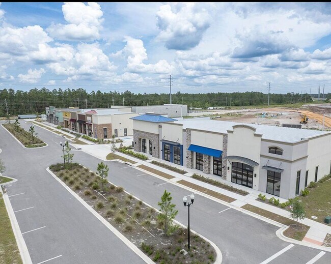 6490 Wy Pt Blvd in Magnolia Square, FL - Building Photo - Building Photo