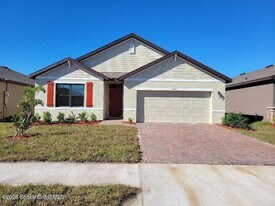 3440 Foggy Mist Rd SE in Palm Bay, FL - Building Photo