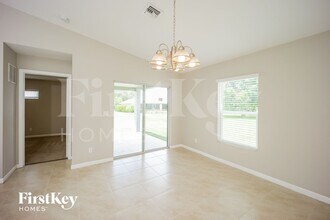 154 NW Curtis St in Port St. Lucie, FL - Foto de edificio - Building Photo