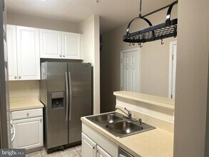 2665 Manhattan Pl-Unit -113 in Vienna, VA - Building Photo - Building Photo