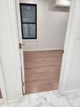 10239 46th Ave, Unit 1st Floor in Corona, NY - Foto de edificio - Building Photo