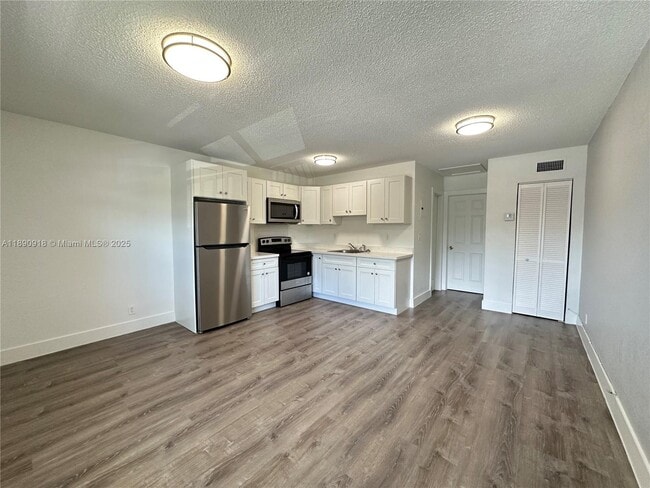 property at 3660 NE 11th Ave