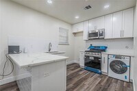 6003 De Moss Dr photo'