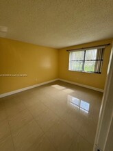 10018 NW 4th St, Unit 203 in Pembroke Pines, FL - Building Photo - Building Photo