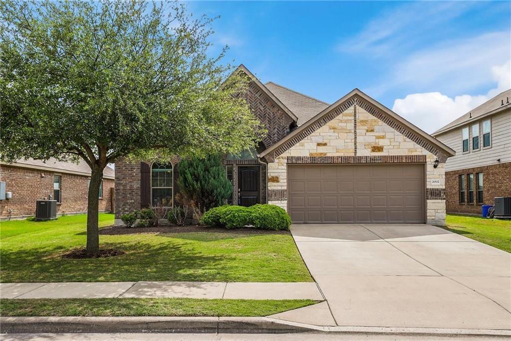 2002 S Ash Cove in Hutto, TX - Building Photo
