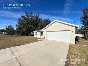 405 Malauka Loop in Ocklawaha, FL - Building Photo - Building Photo