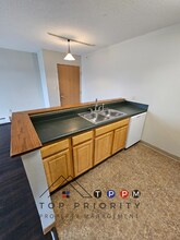 410 13th Ave NW-Unit -Unit 33 in Oelwein, IA - Building Photo - Building Photo