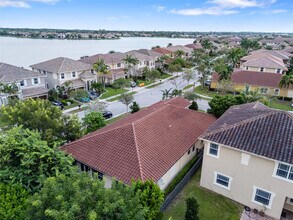 9741 S Miralago Way in Parkland, FL - Foto de edificio - Building Photo