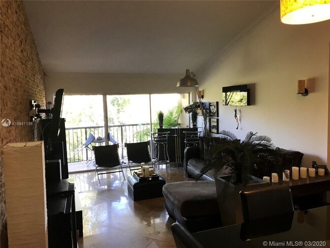 8977 Wiles Rd-Unit -308 in Coral Springs, FL - Building Photo - Building Photo
