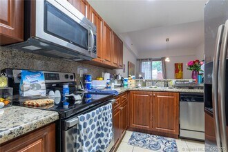 14318 SW 10th St-Unit -2409 in Pembroke Pines, FL - Building Photo - Building Photo