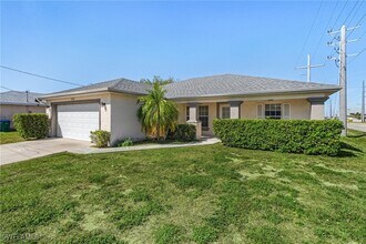 2324 NE Juanita Pl in Cape Coral, FL - Building Photo - Building Photo