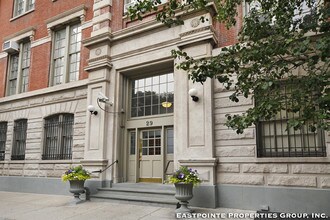 29 King St-Unit -1G in New York, NY - Building Photo - Building Photo
