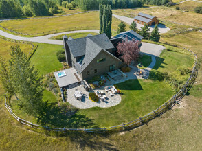 1590 Bustle Creek Rd in Moose, WY - Building Photo - Building Photo