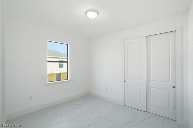 2404-2406 Mae Ave S in Lehigh Acres, FL - Building Photo - Building Photo