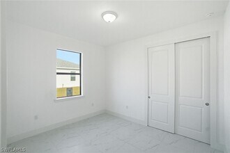 2404-2406 Mae Ave S in Lehigh Acres, FL - Building Photo - Building Photo