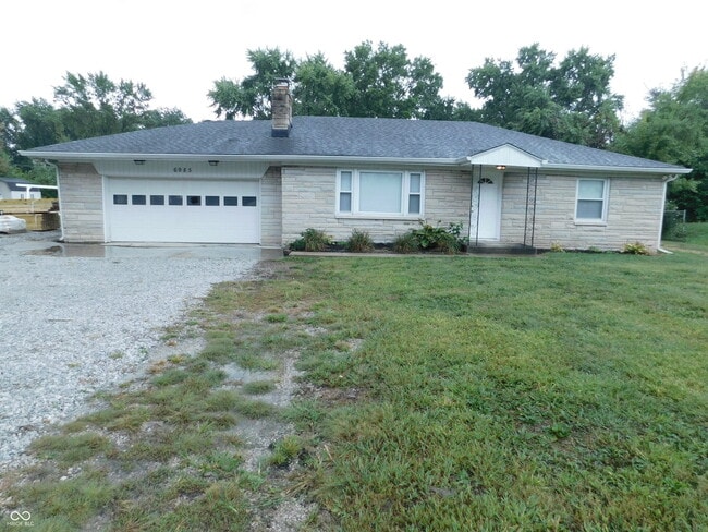 property at 6985 E County Rd 100 S
