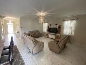 9047 Stinger Dr in Four Corners, FL - Building Photo - Building Photo