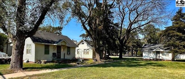property at 110 E 1st St