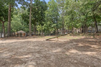 The Retreat at Lake Johnson Apartments in Raleigh, NC - Building Photo - Building Photo