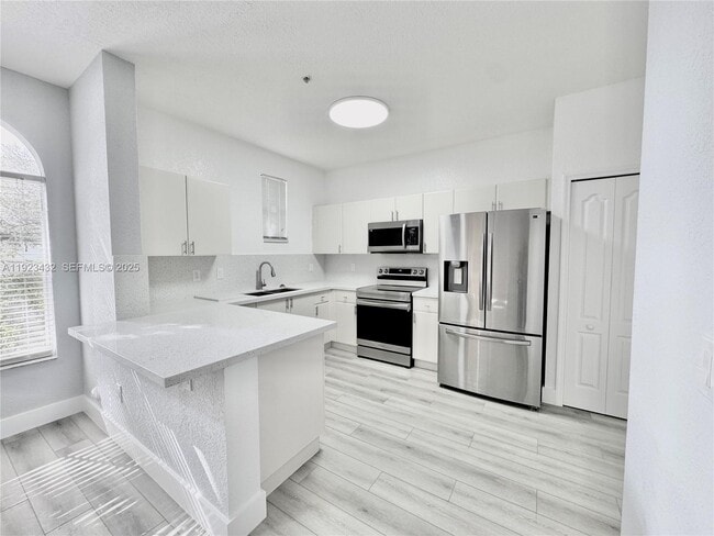 property at 120 Jacaranda Country Club Dr