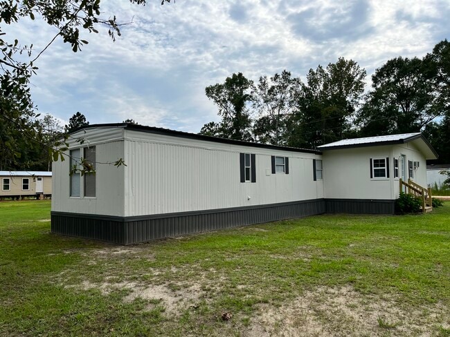 1074 W Union Rd in Carriere, MS - Foto de edificio - Building Photo