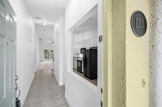 100 Canopy Walk Ln, Unit 133 in Palm Coast, FL - Building Photo - Building Photo