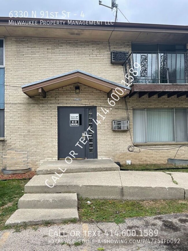 property at 6320-6330 N 91st St