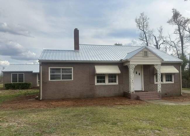 property at 65-63 3rd St