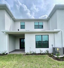 14043 SW Thorens Dr in Port St. Lucie, FL - Building Photo - Building Photo