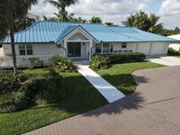 207 Xanadu Pl in Jupiter, FL - Foto de edificio - Building Photo