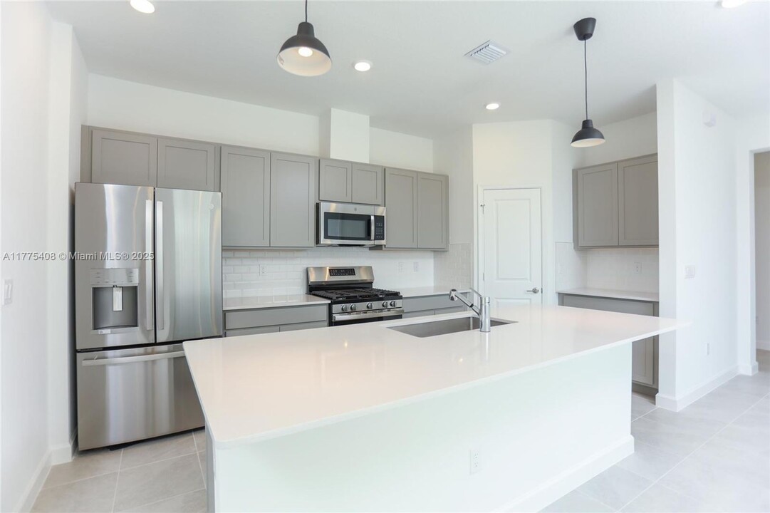 1466 Tangled Orch Trce in Loxahatchee, FL - Building Photo