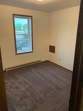 110 Central Ave S, Unit 302 in Milaca, MN - Building Photo - Building Photo