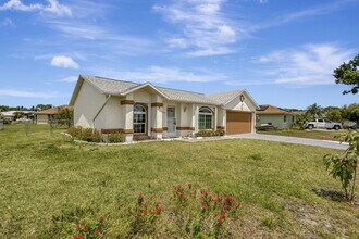 5489 NW Evanston Ave in Port St. Lucie, FL - Building Photo - Building Photo